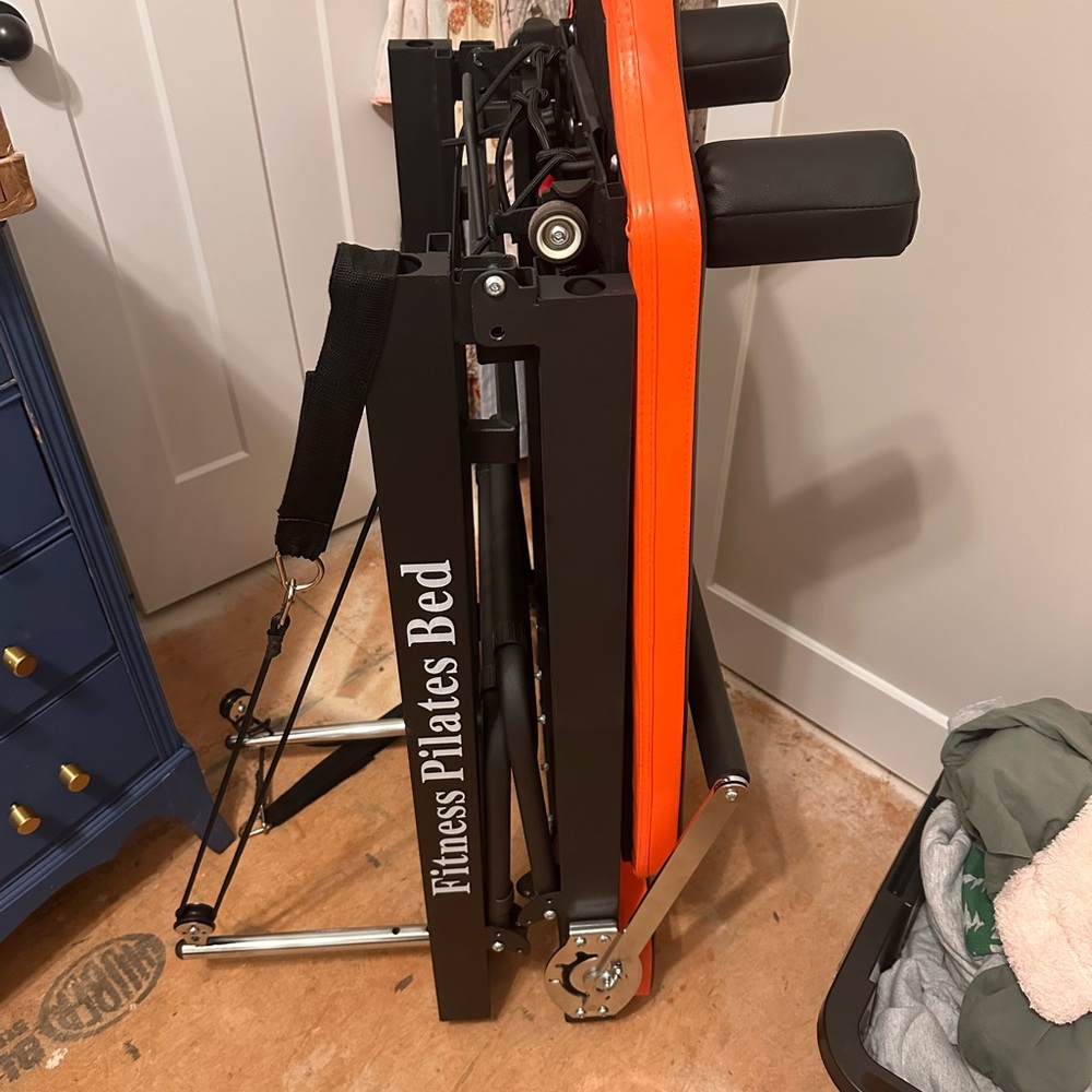 Foldable Fitness Pilates Bed with Orange Accents